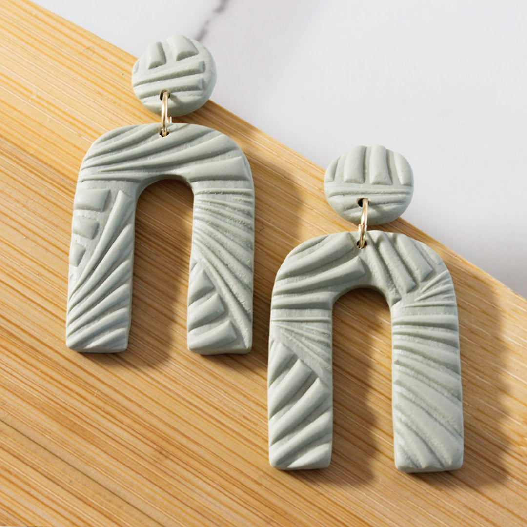 Arch Polymer Clay White Gold Spring Earrings – shopurbanmarketplace