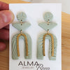 PERSONA Earrings.  Textured Sage Green Polymer Clay Arch earrings with brass dangles