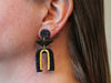 PERSONA Earrings.  Textured Black Polymer Clay Arch earrings with brass dangles